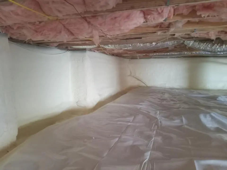 Crawl space encapsulation with closed-cell spray foam for Commercial Roof Restoration in Franklin
